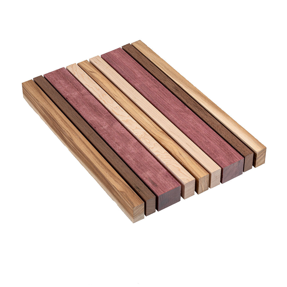 Wooden cutting board with slats of teak, purpleheart, maple, and Peruvian walnut on a white background.